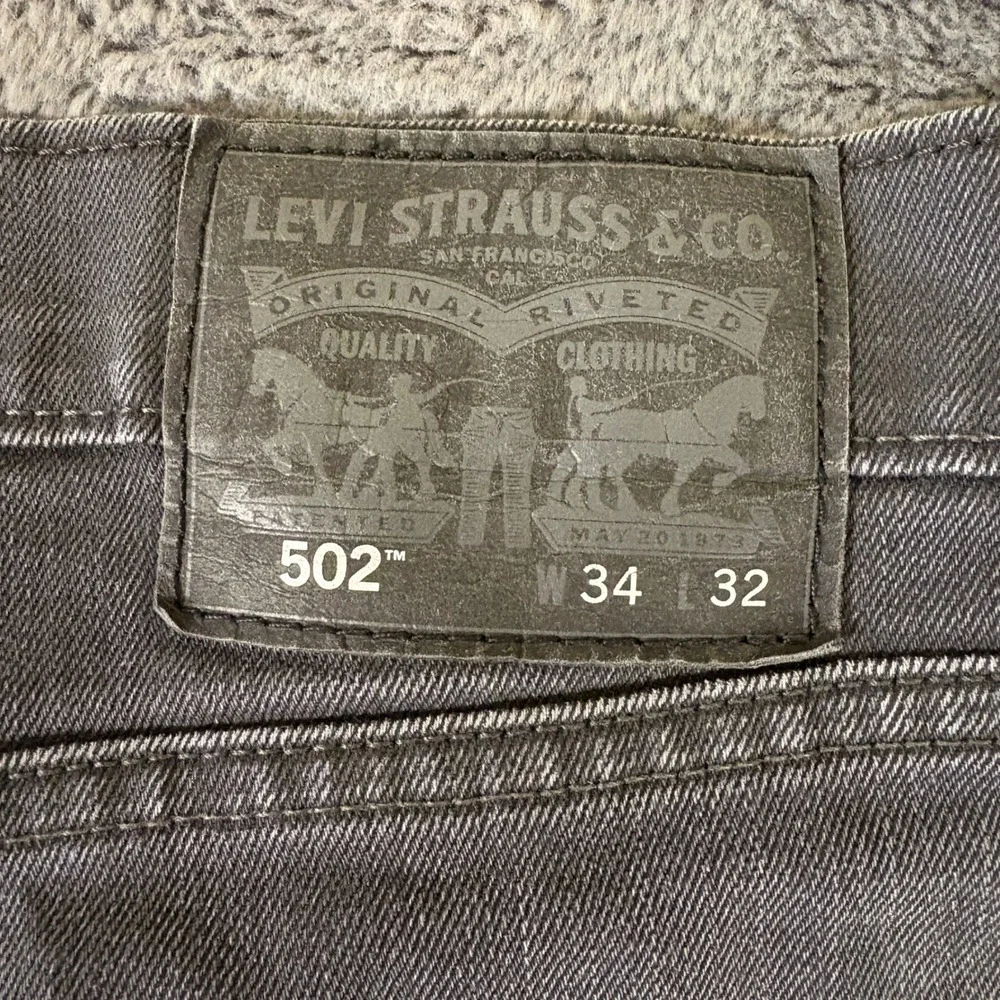 Levis 502 Regular Taper Jeans Mens 34x32 Faded Black Gray Stretch Denim AR691